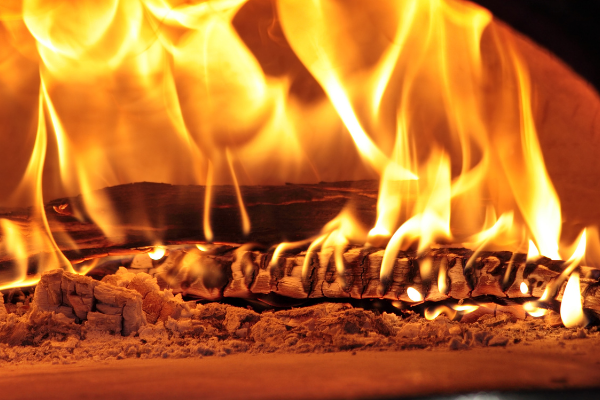 Піч з цегли своїми руками: створення затишку в домі або на дачі